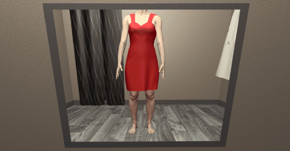 鏡に映る赤いドレス姿の女性のシルエット