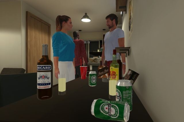 Bouteilles d’alcool posées sur une table lors d’une soirée