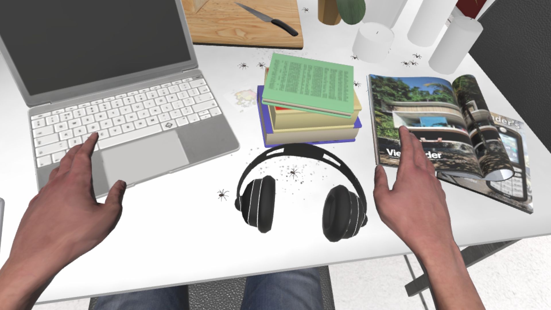 Plusieurs araignées sur un plan de travail en réalité virtuelle