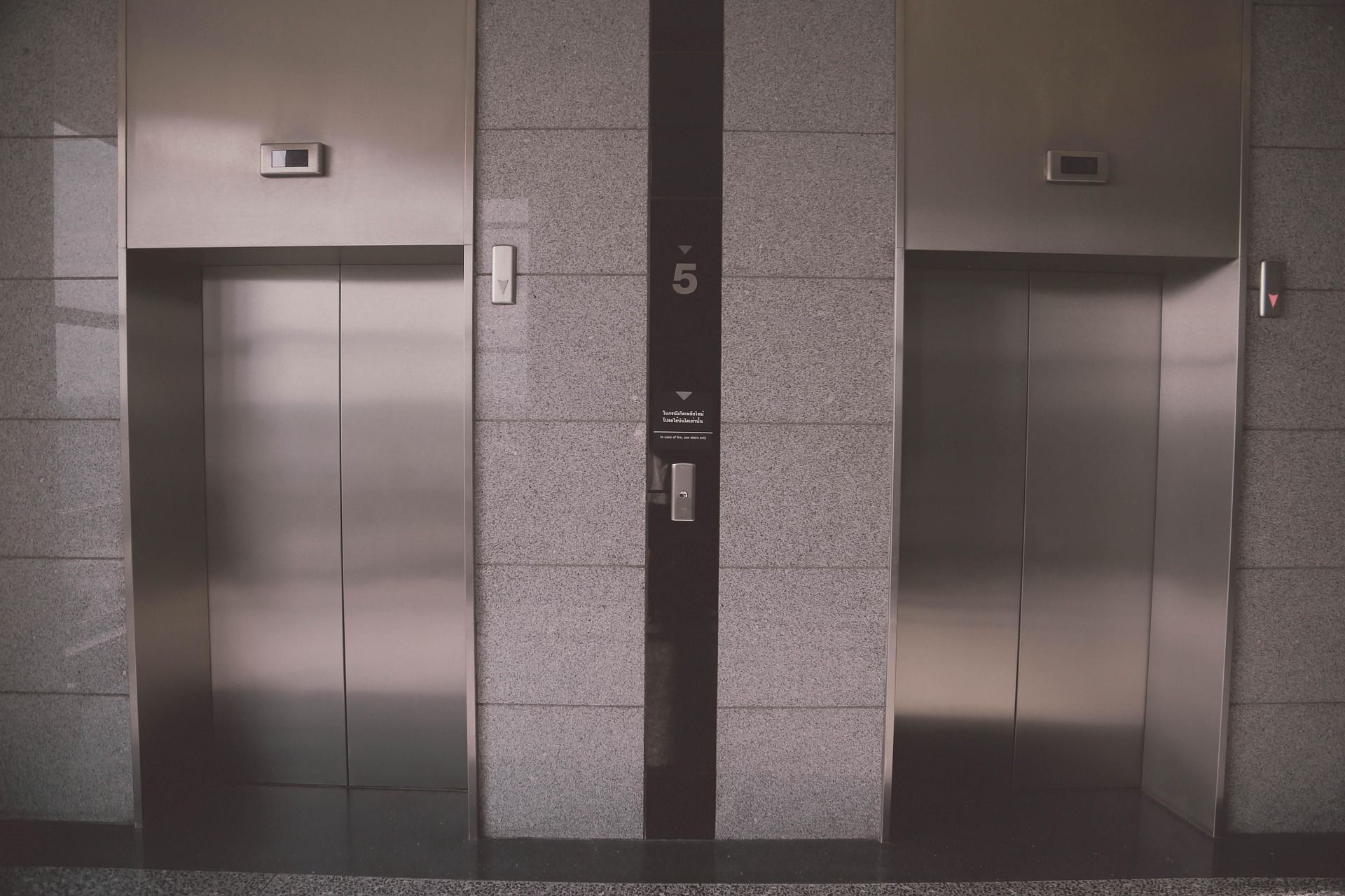 Metal elevator doors in a confined space