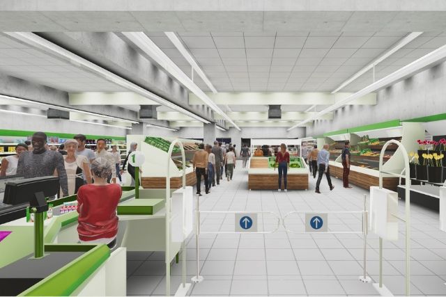 Supermercado muy concurrido visto desde la entrada