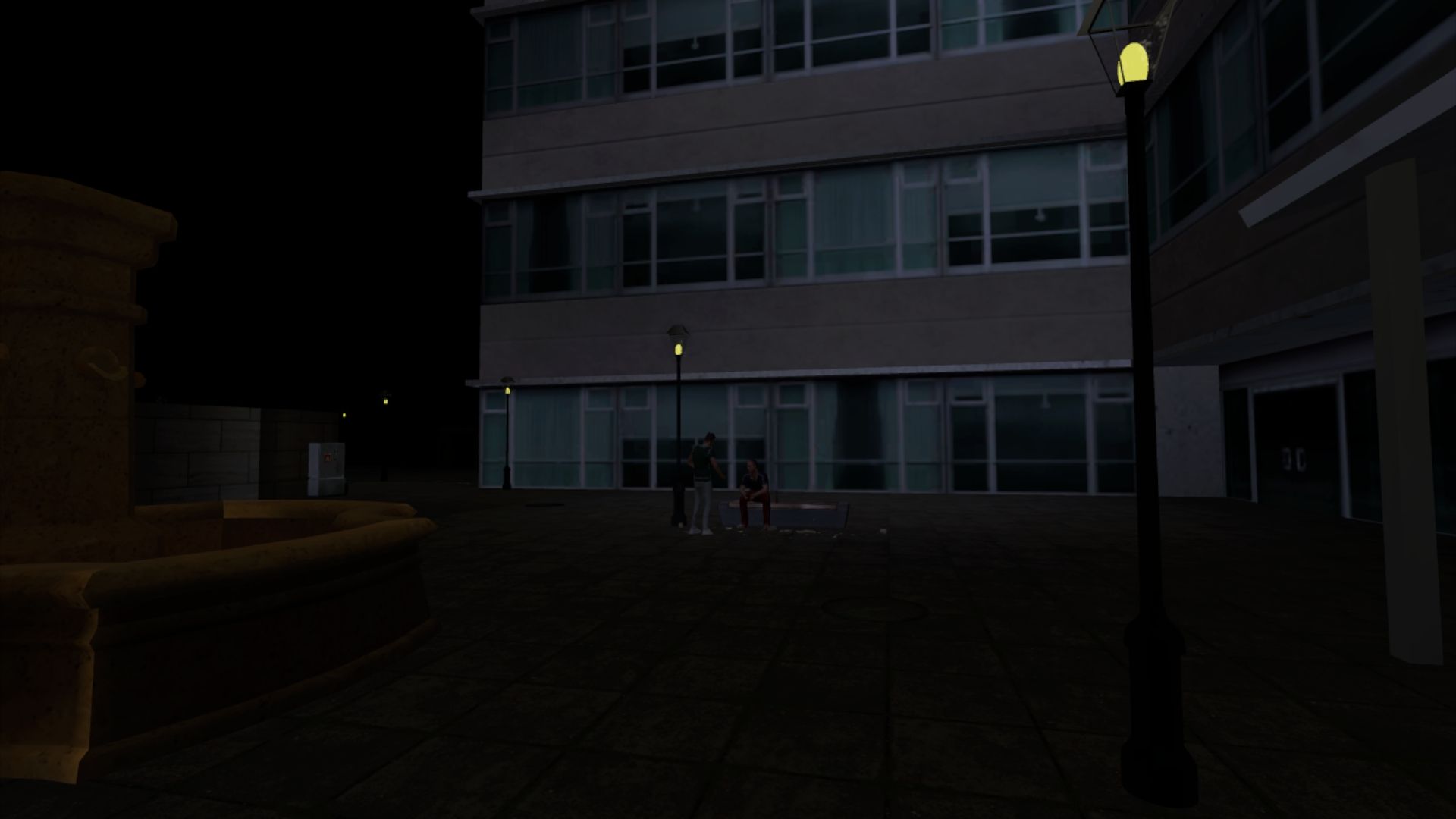 Empty city square at night