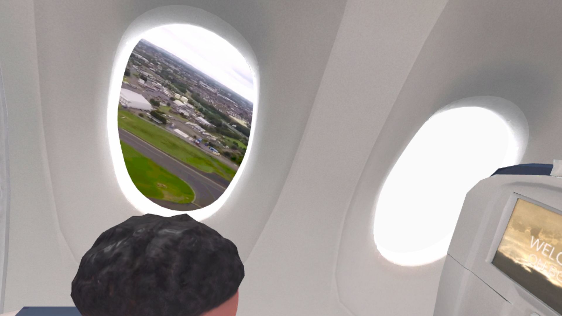 Start durch die Fenster eines Flugzeugs gesehen