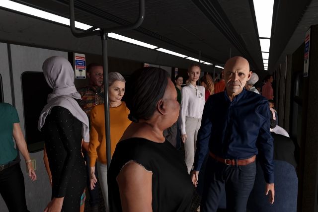 Voyageurs debout dans une rame de métro bondée